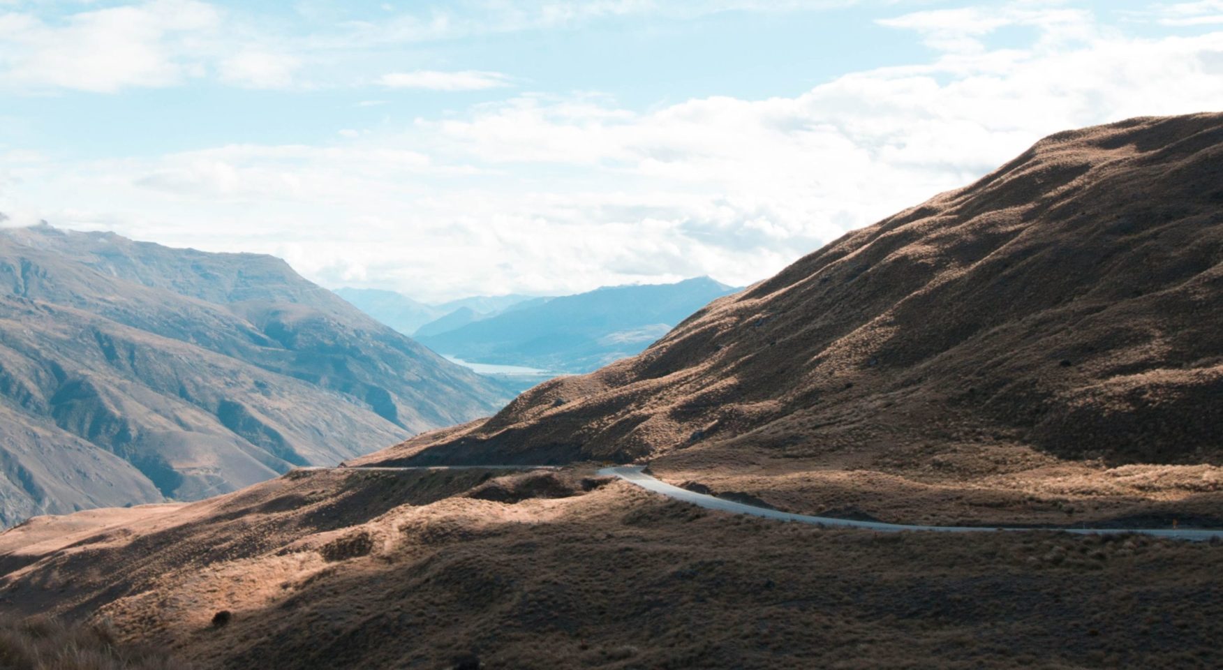 Road winding through brown mountains