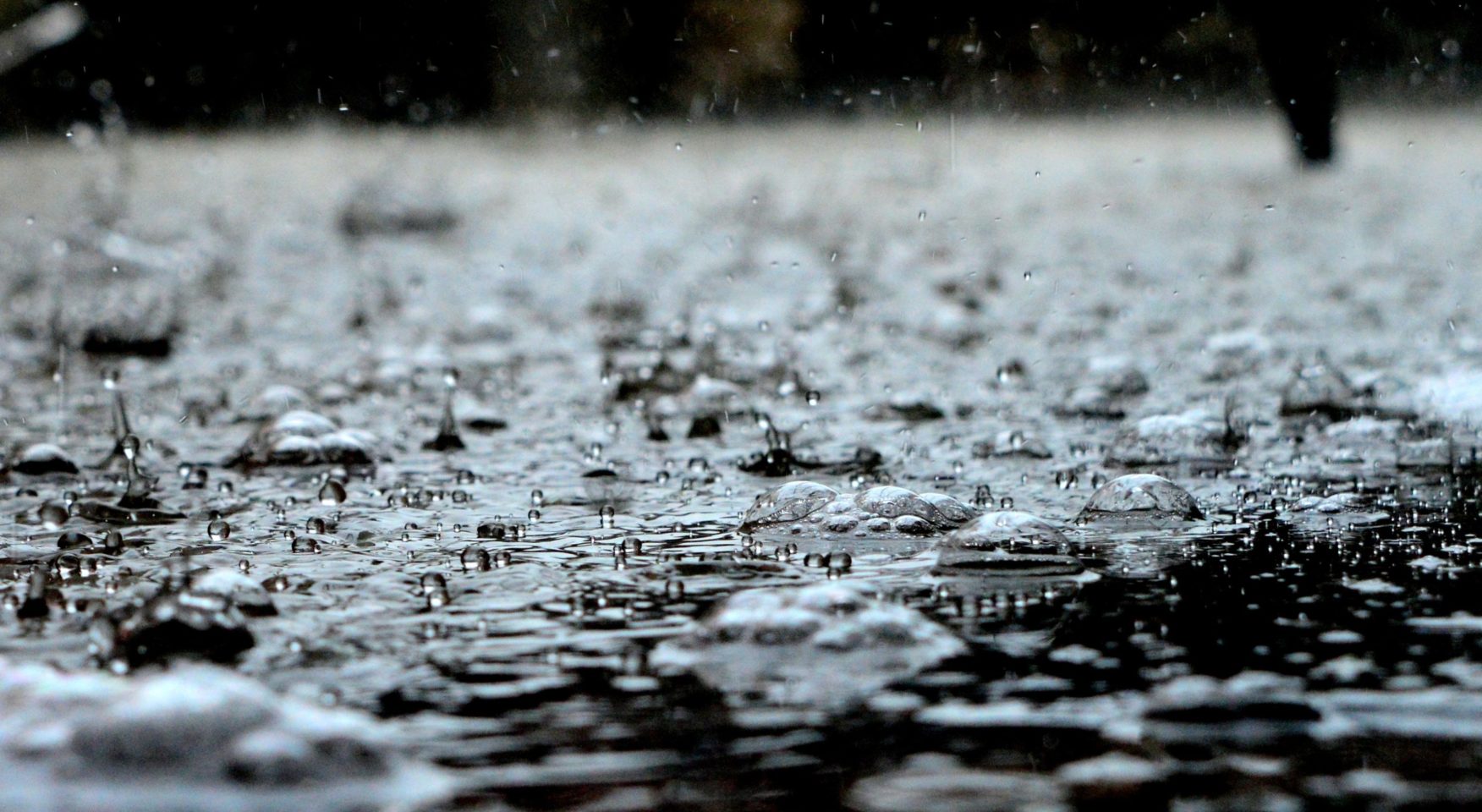 rain splashing on pavement